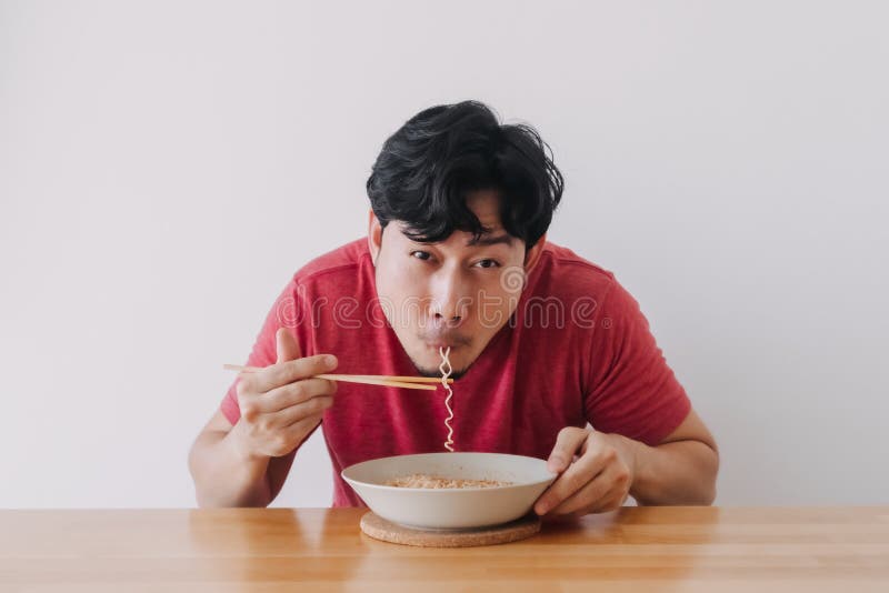 Man Eat Instant Noodle Very Deliciously. Stock Image - Image of ...