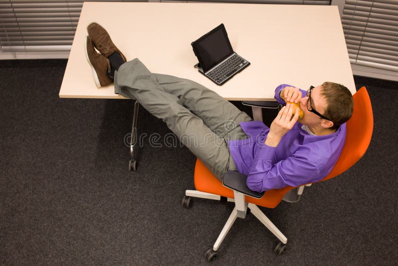 Man Eating Hamburger in Office Fast Food Stock Image Image of