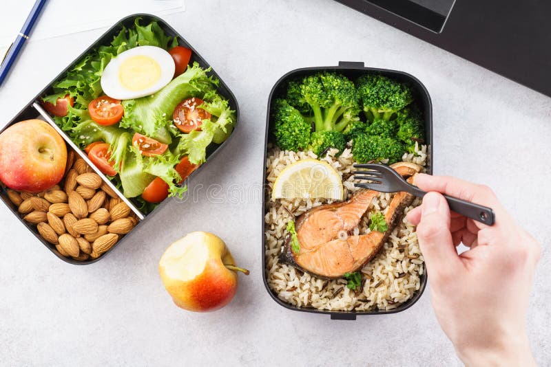 Man Eating Lunch from Takeaway Lunch Box at Working Table Stock Image ...