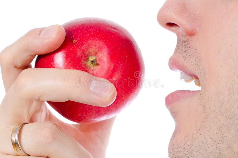 Man eating a red apple