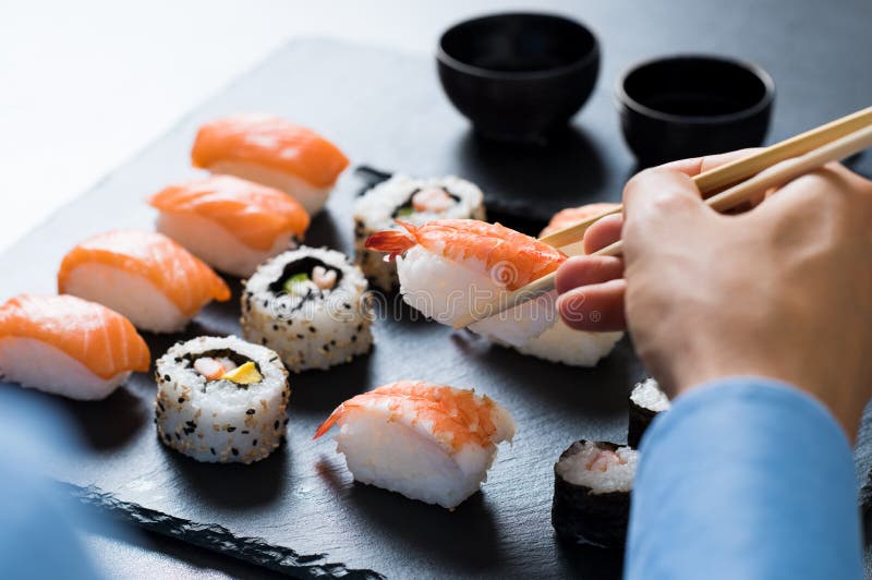 Man eating sushi