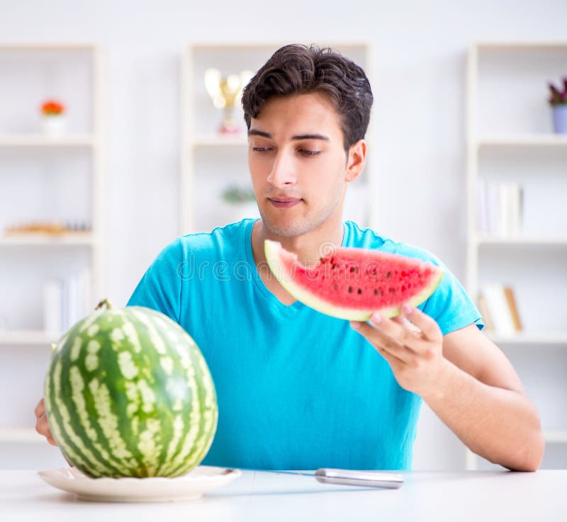 Man Eating Watermelon at Home Stock Photo Image of food, meal 208506134