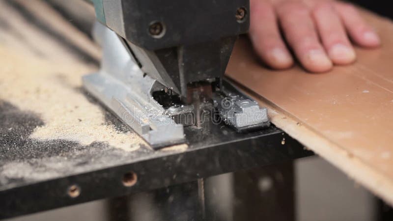 Man Cutting Laminate Flooring With Electric Hand Saw Stock Video