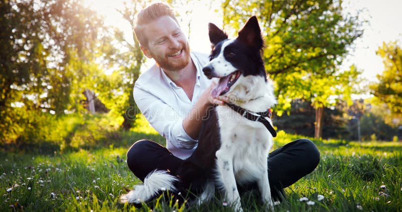 Man embracing his dog royalty free stock image Man embracing his dog royalty free stock image