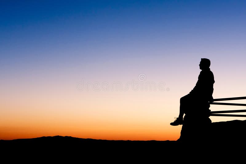 Man enjoying an amazing view at sunset