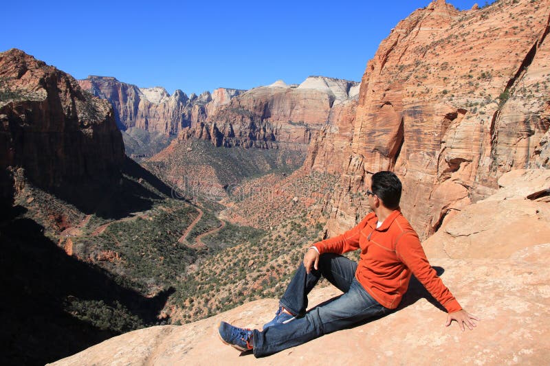 Man Enjoying the View of a Zion National Park