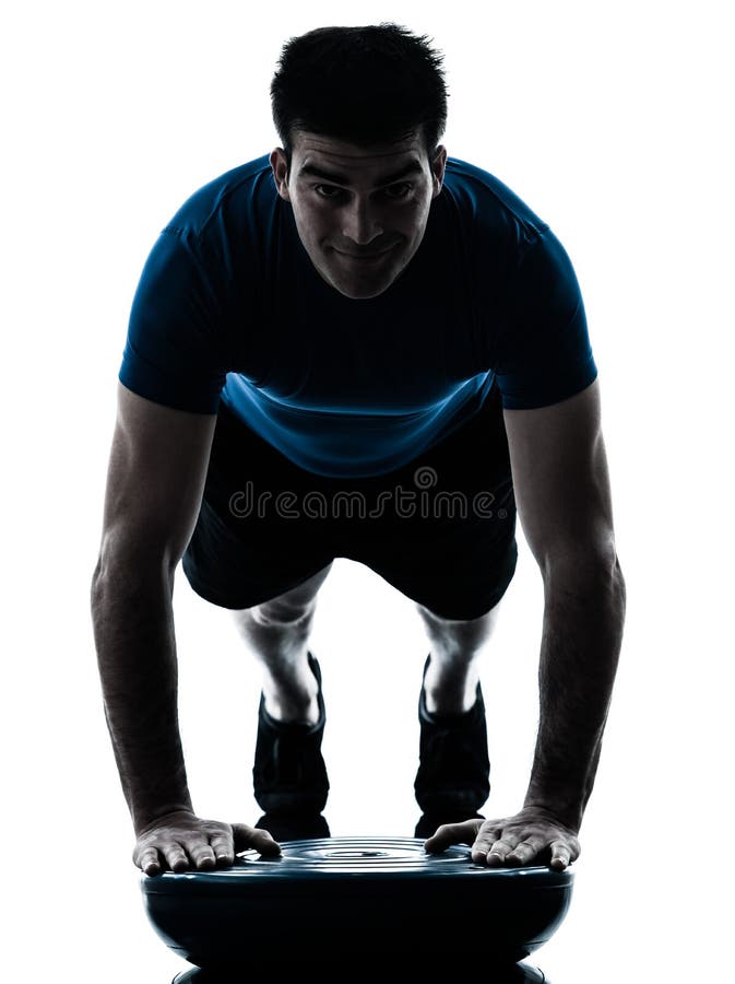 Man exercising bosu push ups workout fitness posture stock images Man exercising bosu push ups workout fitness posture stock images
