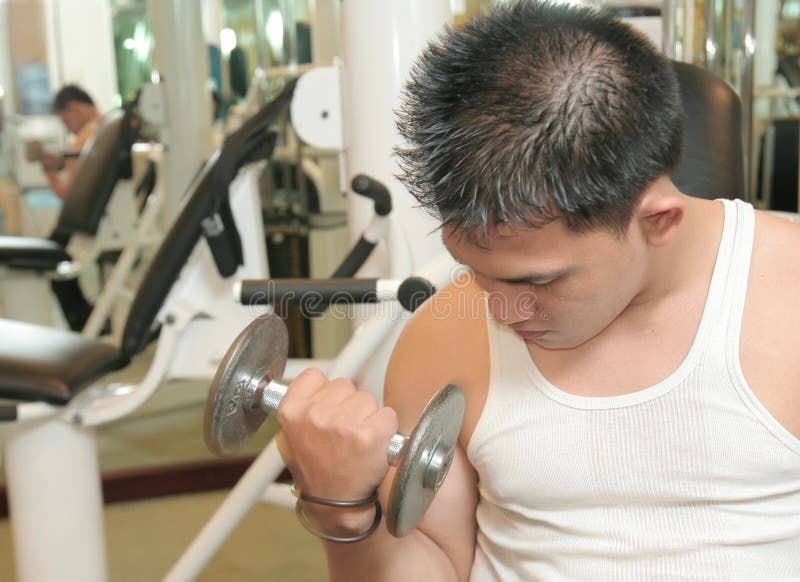 Man exercising smiling