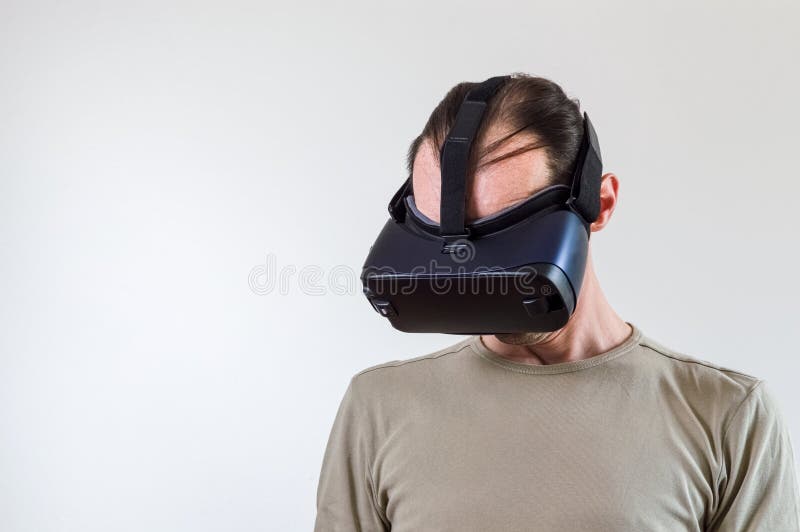 Man exploring modern technology virtual reality with head mounted display on white background stock images Man exploring modern technology virtual reality with head mounted display on white background stock images