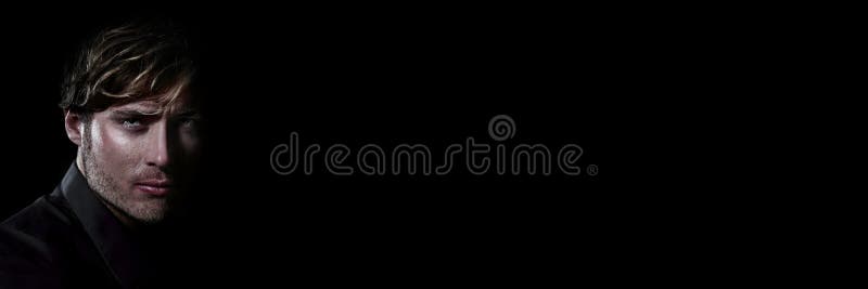 Man face beauty model on dark black background panoramic male portrait royalty free stock photography Man face beauty model on dark black background panoramic male portrait royalty free stock photography