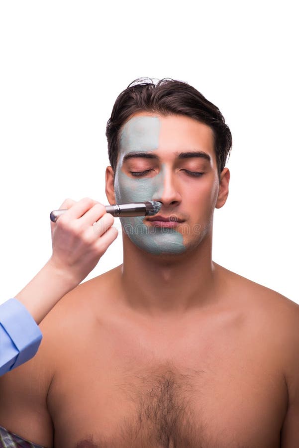 The Man with Face Mask Being Applied on White Stock Photo Image of