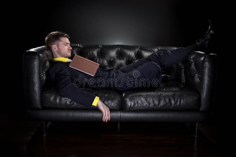 Man Falling Asleep while Reading Stock Photo - Image of couch, bookworm ...