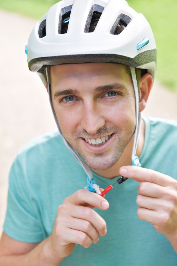 Man Fastening Strap Cycle Helmet Stock Photos Free & RoyaltyFree