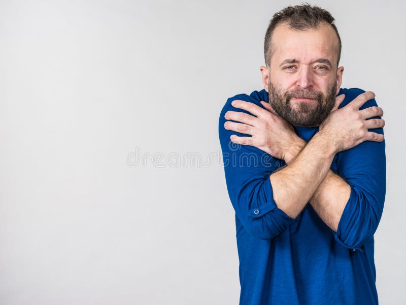 Man feeling cold gesturing stock photo. Image of sick 231289612