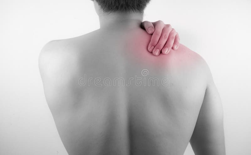 A man feeling exhausted and suffering from neck and shoulder pain and injury on white background. Healthcare and medical concept