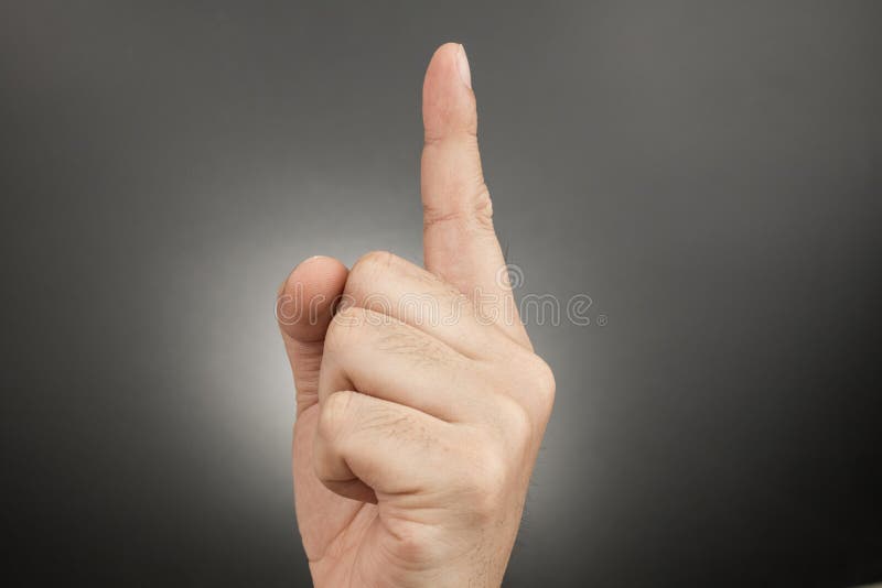 Man finger pointing and touching isolated on black background. Finger point down stock images, royalty-free photos and pictures