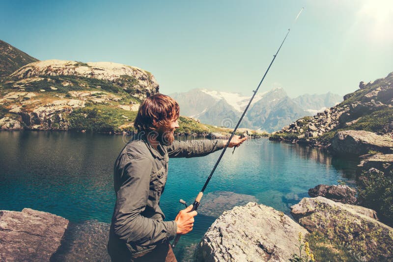 Man Fisherman fishing with rod alone royalty free stock image Man Fisherman fishing with rod alone royalty free stock image