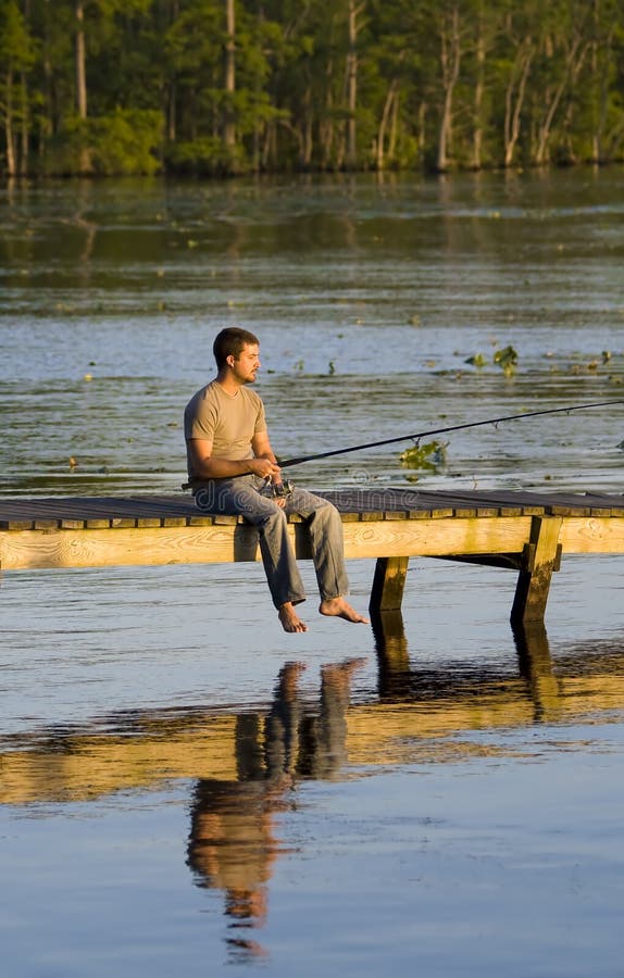 2,851 Man Fishing Dock Stock Photos - Free & Royalty-Free Stock Photos from  Dreamstime