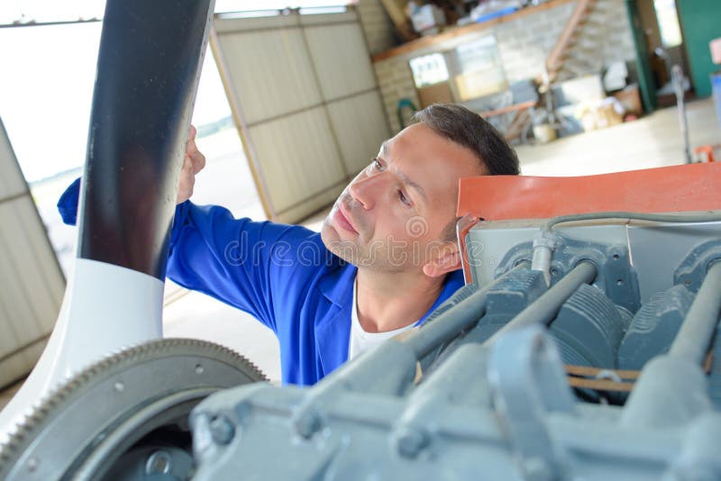 Man fixing propeller stock image. Image of repair, certificate 271107805