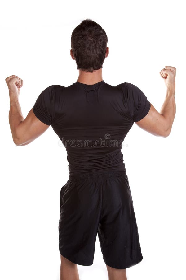 A back view of a strong man flexing. A back view of a strong man flexing.