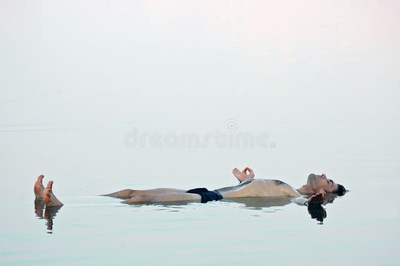 Man Floating in a Glassy Water of Dead Sea Stock Image Image of enjoy