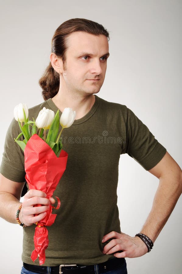 Man with flowers stock photo. Image of flowers, tulips 29668550