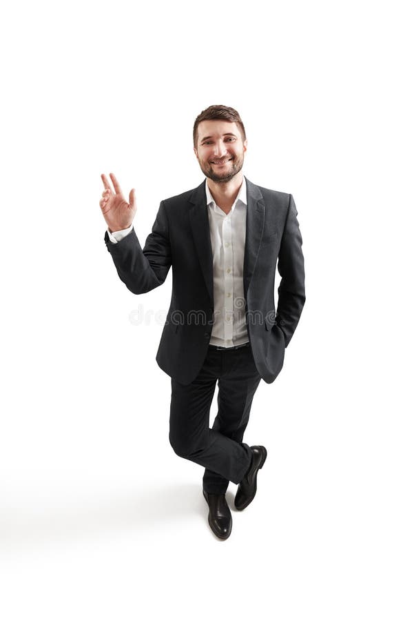 Man in formal wear waving his hand