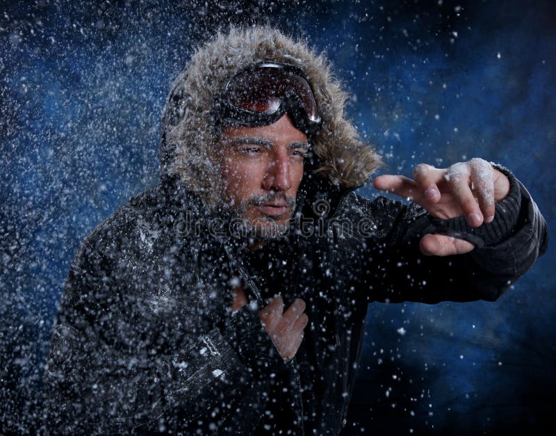 Dramatic Image of Scruffy Man Freezing in Cold Weather stock image.