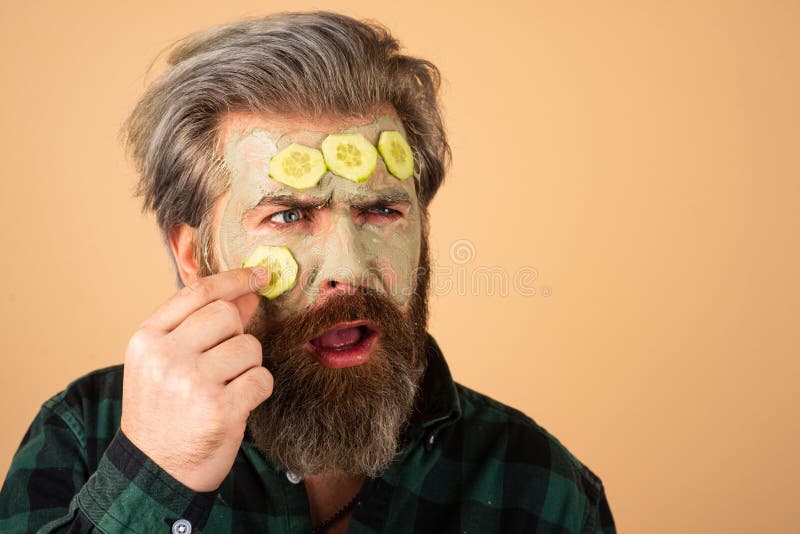 Man Fun Facial. Funny Man with a Clay Mask. Male Bearded Model with ...