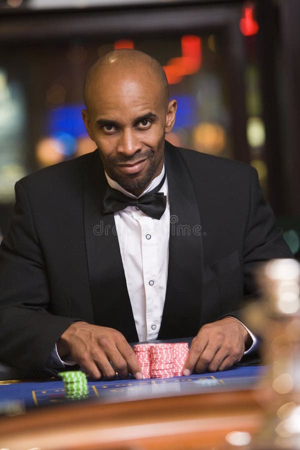 Man Gambling in Casino at Roulette Table Stock Photo Image of camera