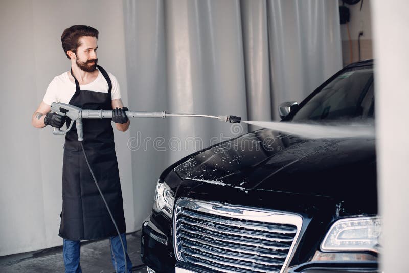 Man Washing His Car in a Garage Stock Image Image of people, mechanic