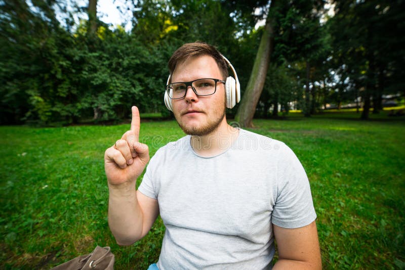 Man Get an Idia while Sitting in the Park Stock Image - Image of