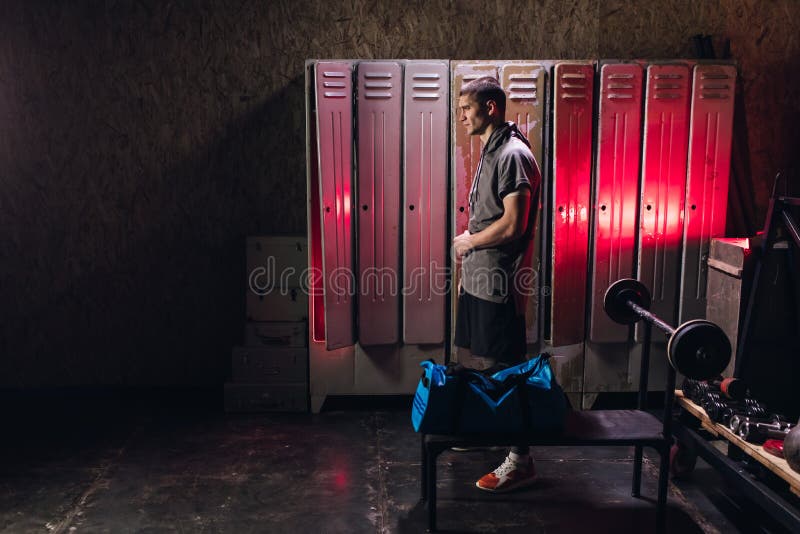 Man Get Ready for Boxing Training in the Locker Room Stock Image
