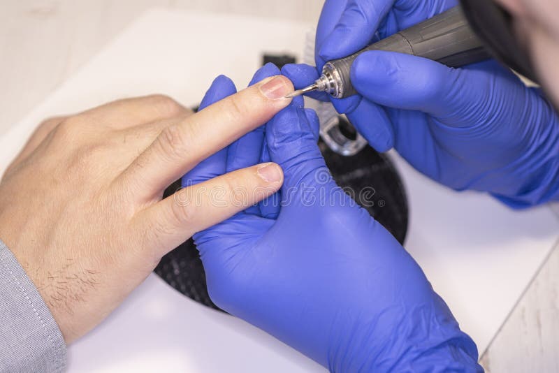 Man Gets His Manicure Done, Hands Closeup. Professional Manicure for ...