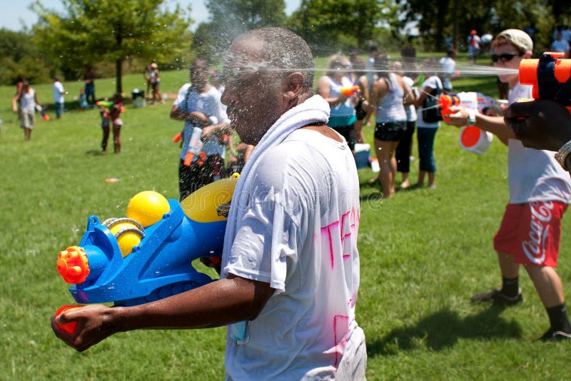 Man Gets Soaked in Water Gun Fight Editorial Photo Image of drenched