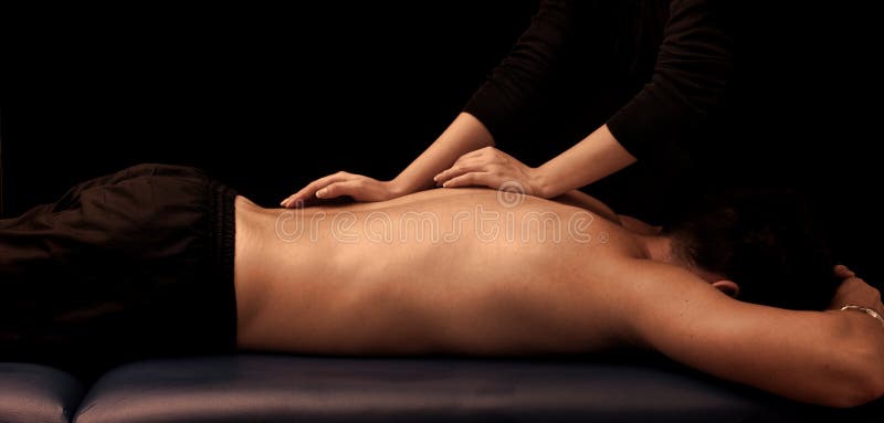 Man getting a back massage royalty free stock image. 