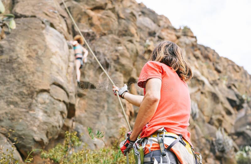 Mountain Climbers Brave Extreme Terrain, Using Steel Equipment To ...