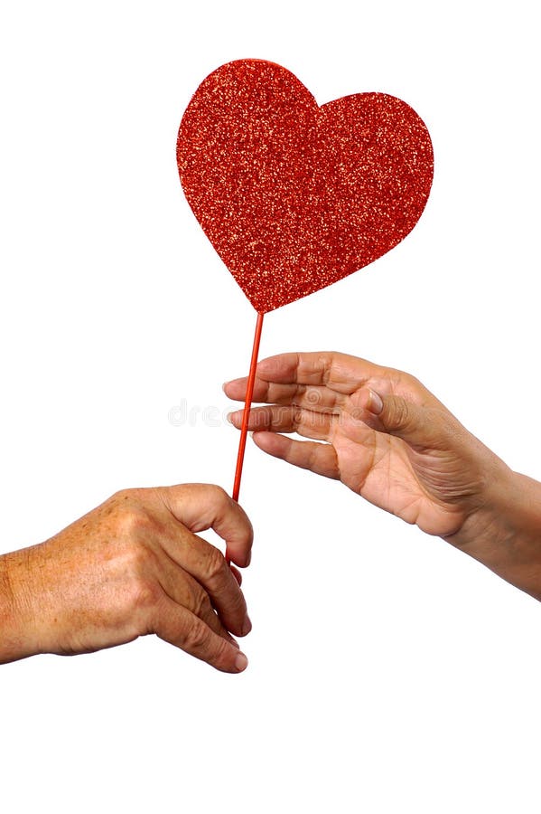 A man giving a female a heart