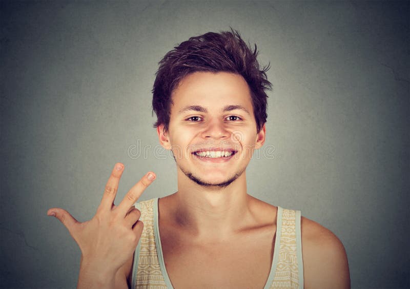 Man Giving a Three Fingers Sign Gesture with Hand Stock Photo Image