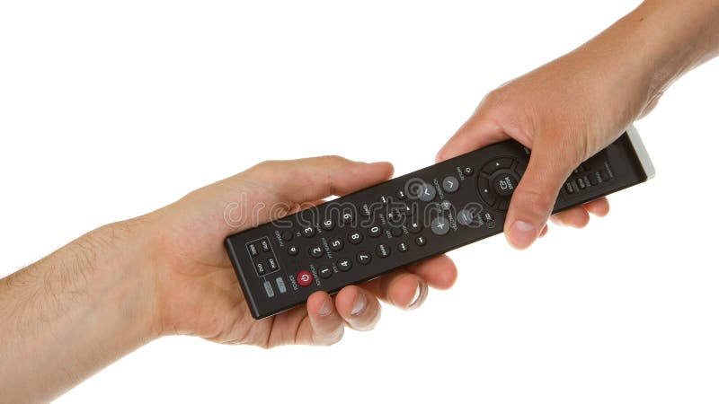 Man giving woman a black remote royalty free stock photo
