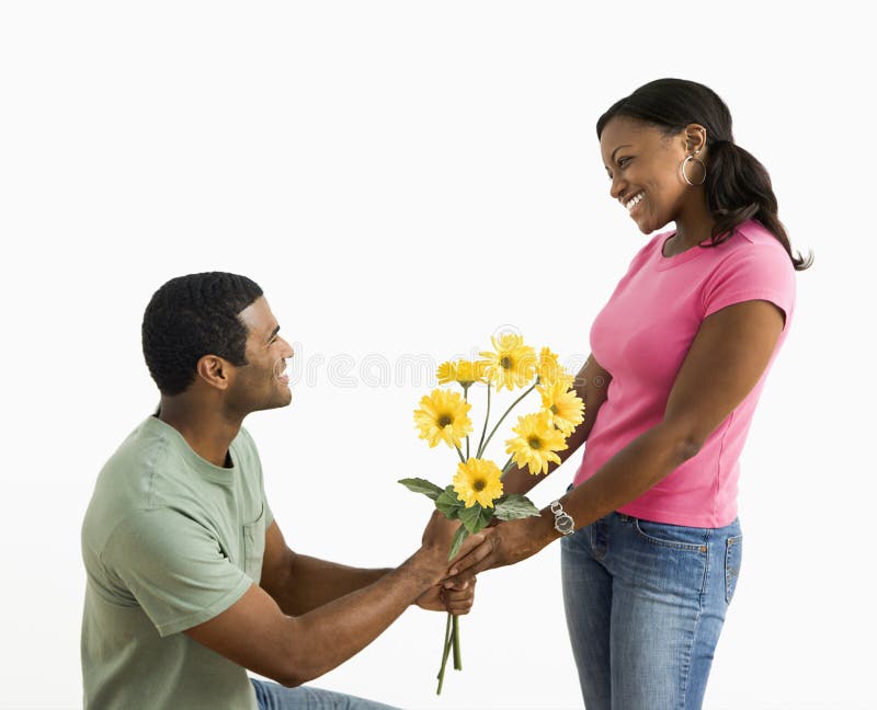 Man Giving Woman Flowers. Royalty Free Stock Images Image 6152529