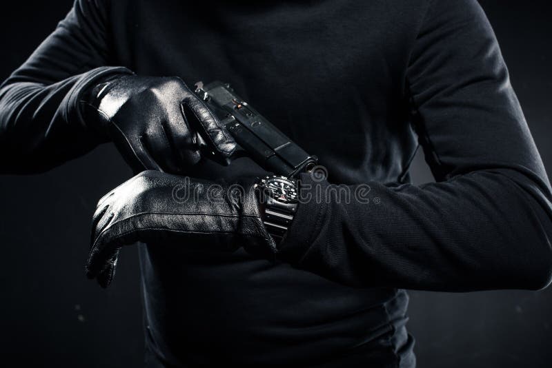 Man in Gloves with Gun Checking Stock Image Image of black, safe 120915195