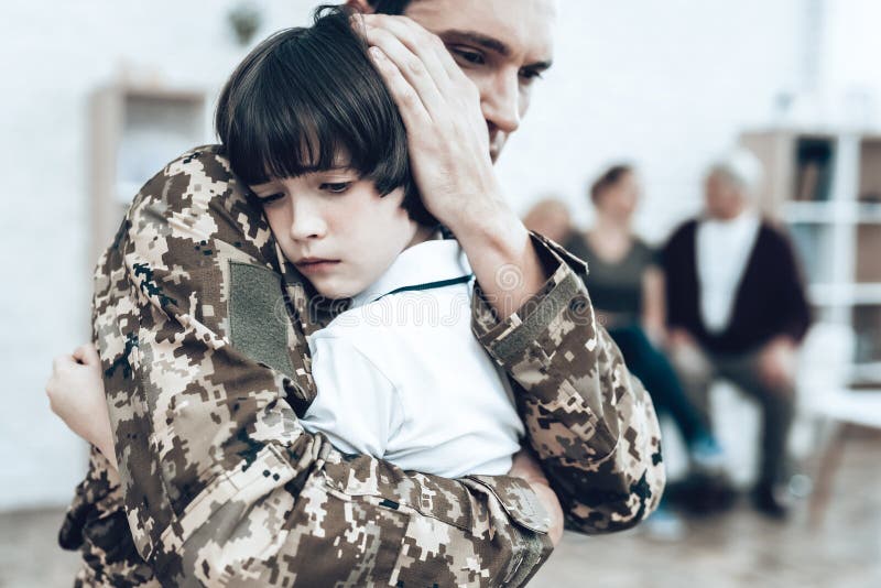 A Man Goes To Military Service. Saying Goodbye. Leaving To Army. Farewell With Family. Camouflage Uniform. Son Hanging. Feelings Showing. Guard Of Peace. Patriotic Decision. Soldier Emotion. A Man Goes To Military Service. Saying Goodbye. Leaving To Army. Farewell With Family. Camouflage Uniform. Son Hanging. Feelings Showing. Guard Of Peace. Patriotic Decision. Soldier Emotion.