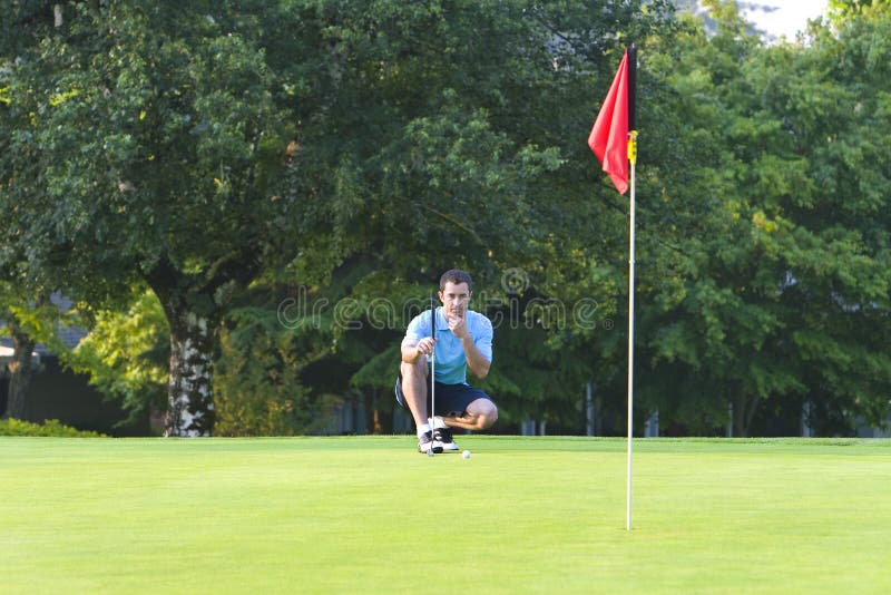 Man on Golf Course Playing Golf - Horizontal