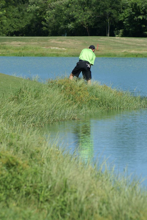 Man Golfing out of the Rough