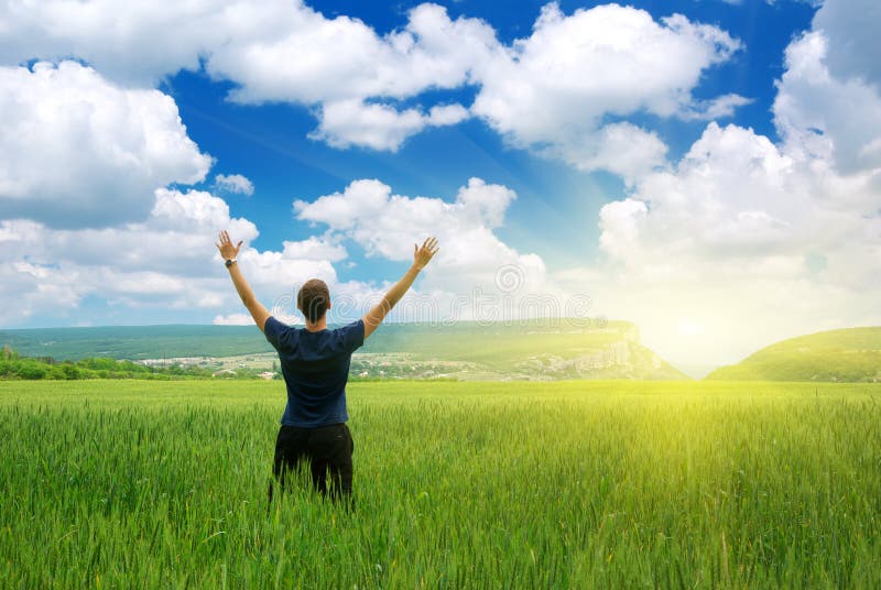 Man in green meadow