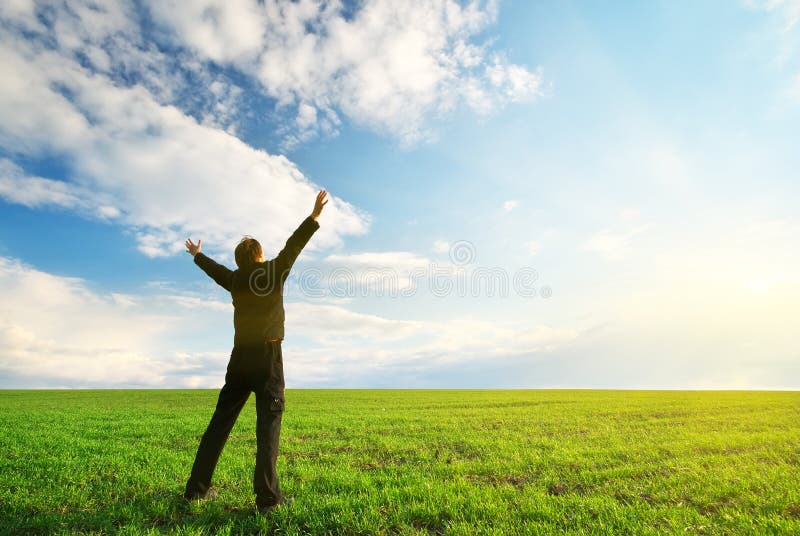 Man in green meadow