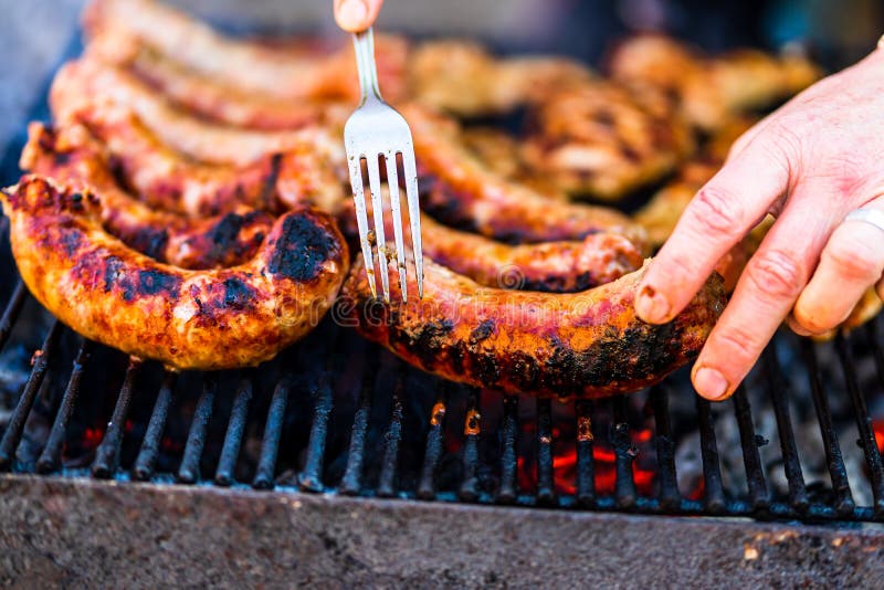 Man Grilling Sausages on a Barbecue Grill Stock Image Image of picnic