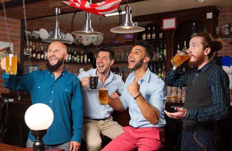 Man Group in Bar Screaming and Watching Football, Drinking Beer Hold ...