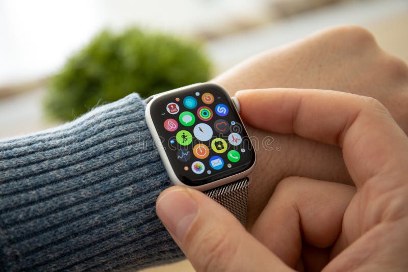 Man Hand with Apple Watch Series 4 Finger Touching Screen Editorial Photography - Image of